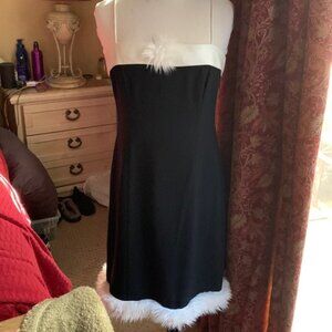 Adorable black and white satin dress. Perfect for the holidays.